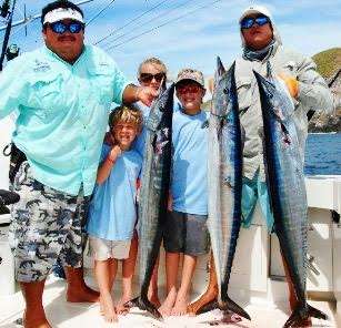 Family with wahoo caught in Costa Rica
